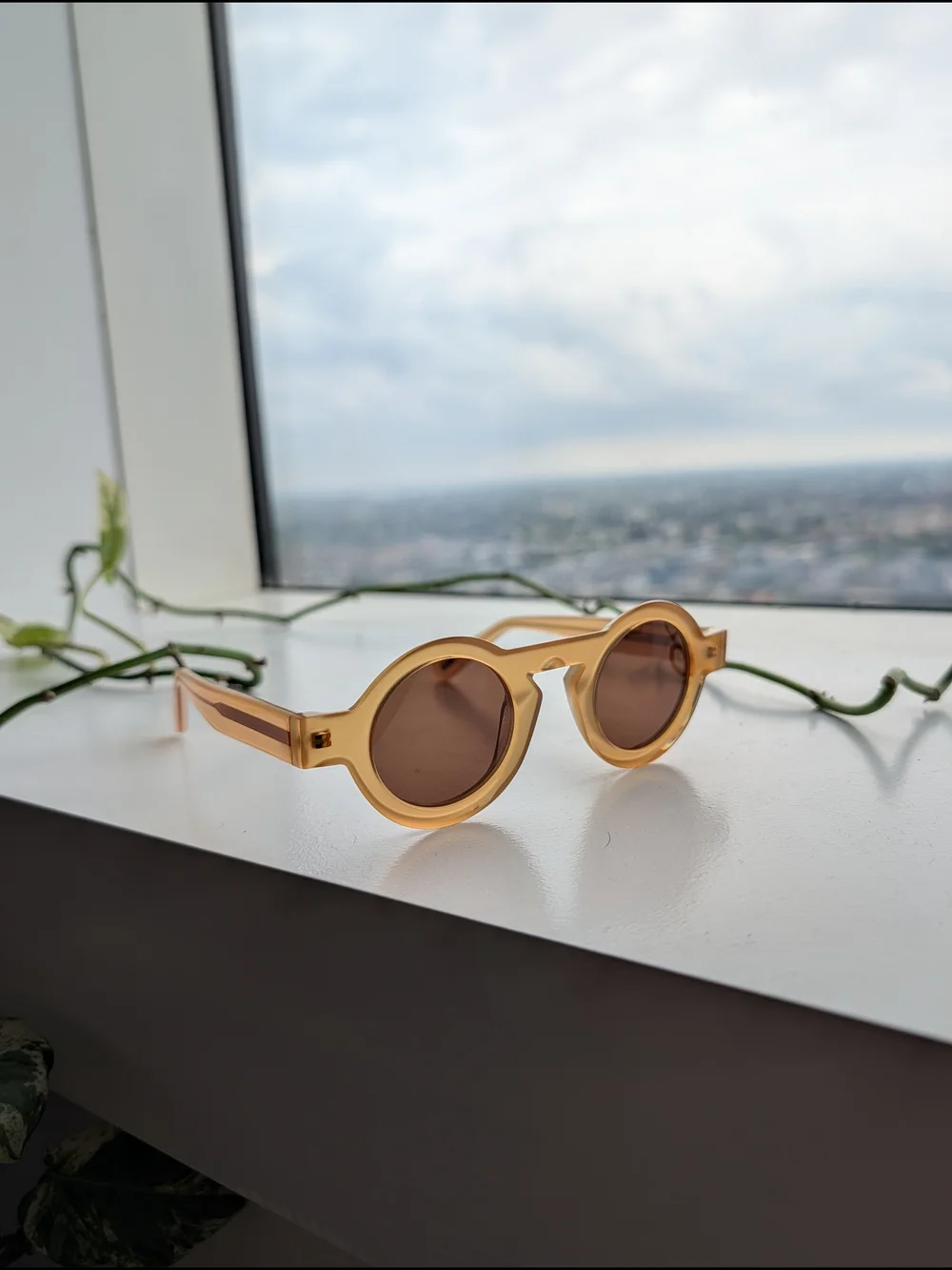 See Eyewear 1860 Round Sunglasses in Translucent Amber Brown Lens